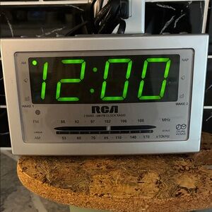 RCA Silver Digital Alarm Clock Radio with Green LED Display